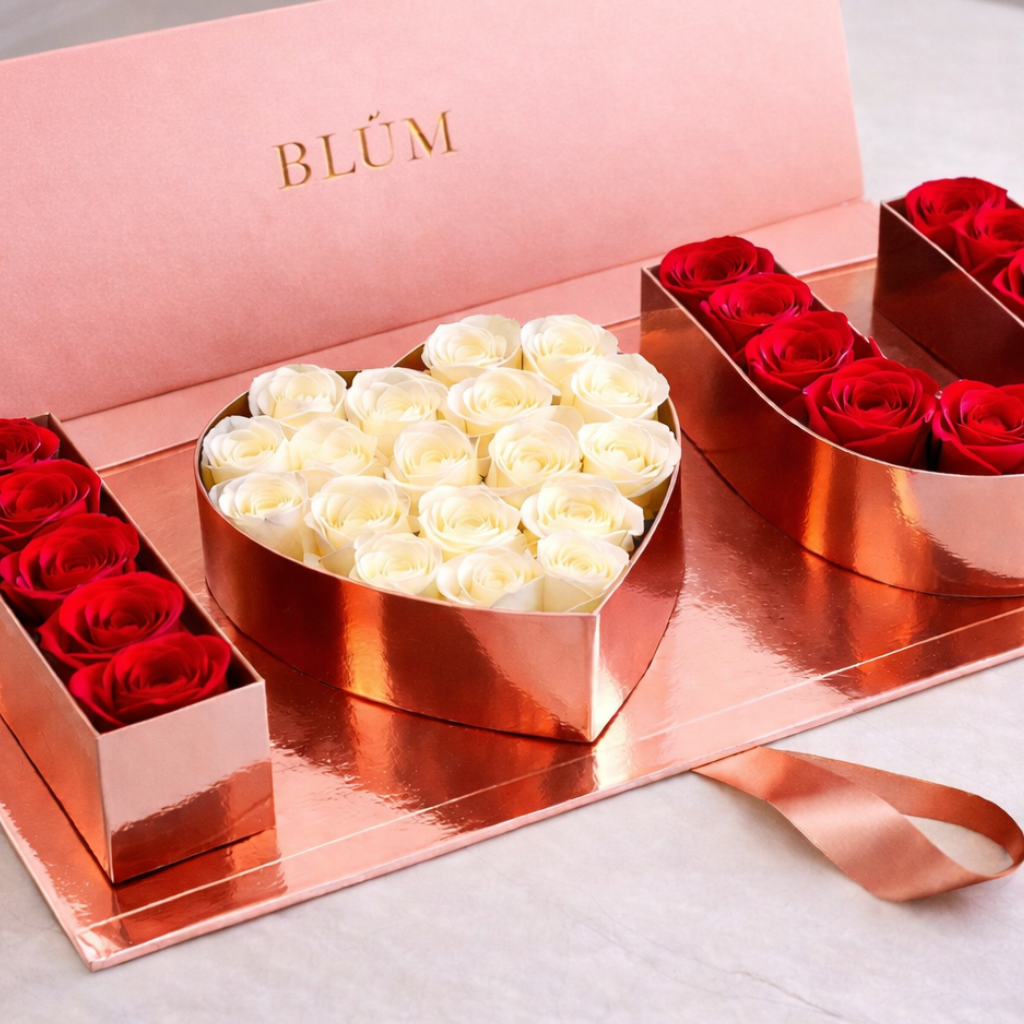 Red roses with Ferrero Rocher chocolates in a modern heart-shaped box
