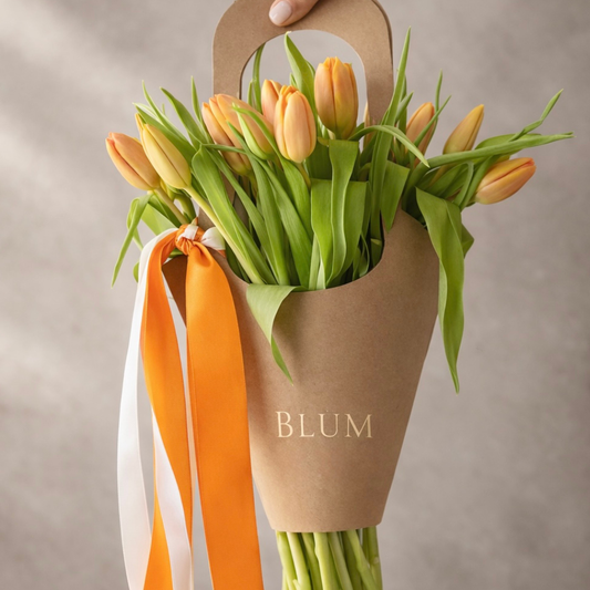 Orange tulips bouquet in modern kraft wrap – International Women’s Day flowers delivery in Miami and Sunny Isles by BLÜM florist
